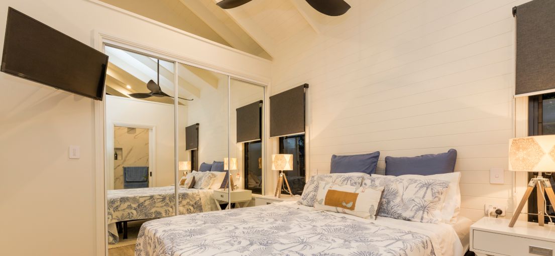Elegant Master Bedroom with Custom Roller Window Shades
