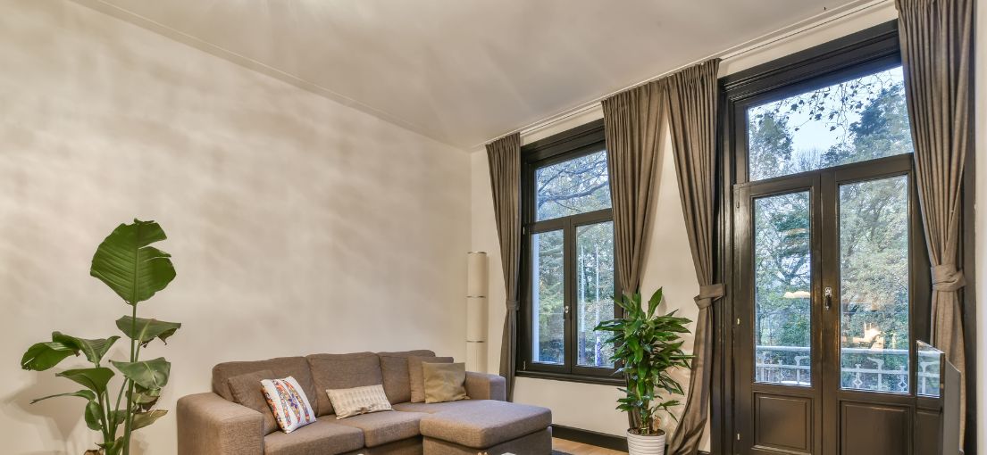 Custom window treatments bring sophistication to this Calabasas living space.