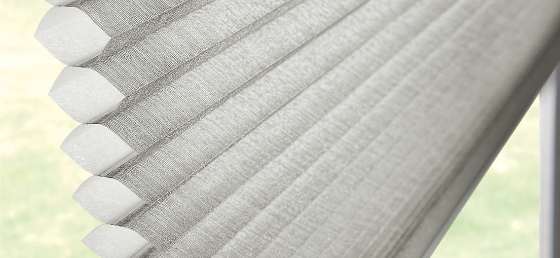 Upgrade your Calabasas home with energy-efficient cellular shades for a comfortable bedroom.