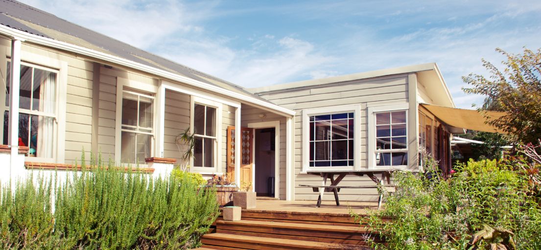 House with exterior shades for reduced energy bills.
