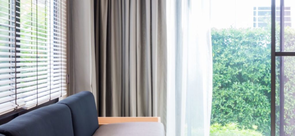 Durable faux wood blinds offer the beauty of wood with the practicality of moisture resistance.