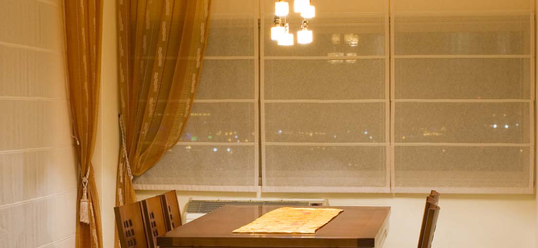 Privacy and style: Roman shades for Thousand Oaks dining room windows
