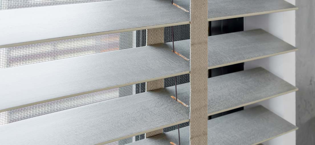 Detail of stylish Venetian blinds, a perfect window treatment solution for an Alhambra office space.