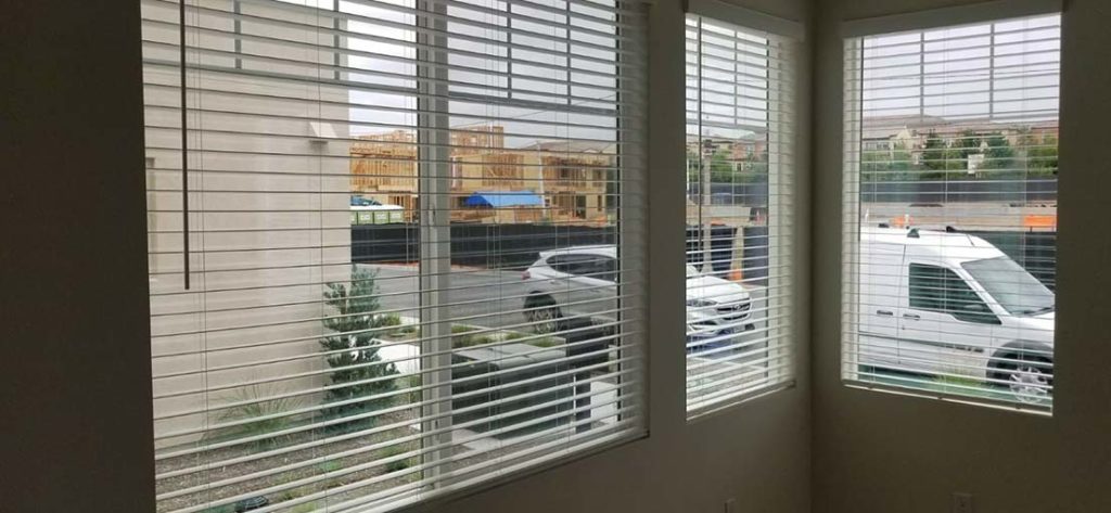 Venetian blinds reduce glare and enhance comfort in this Long Beach workplace.