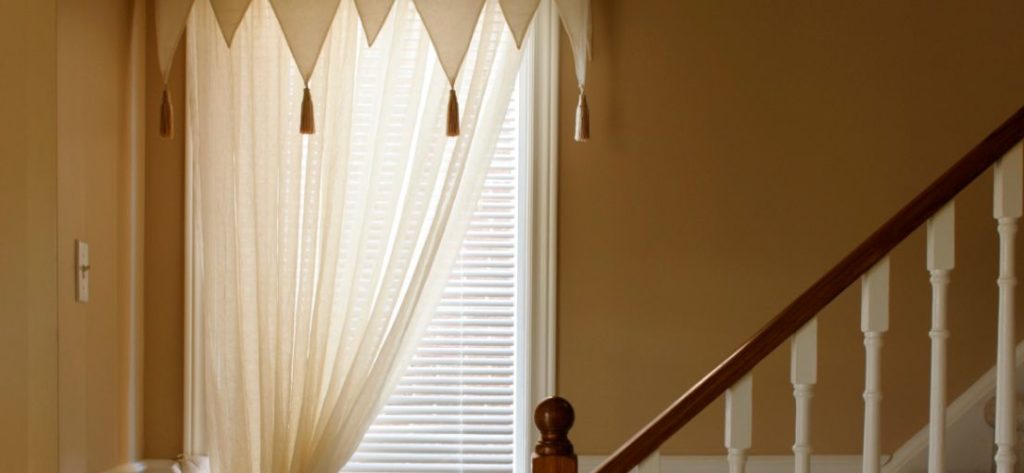Window featuring vinyl blinds in a neighborhood close to Glassell Park.