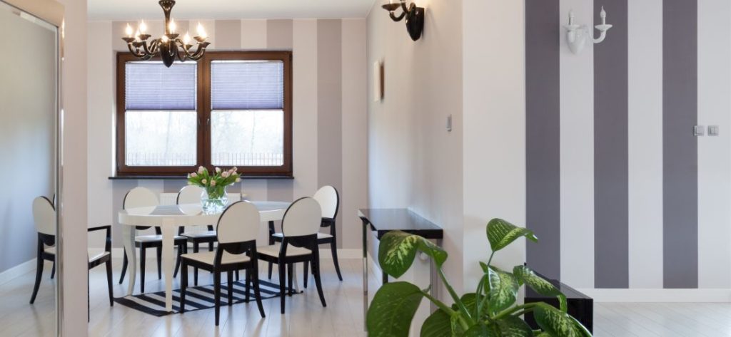 Modern sophistication meets functionality: Remote control blinds in a Pomona home.