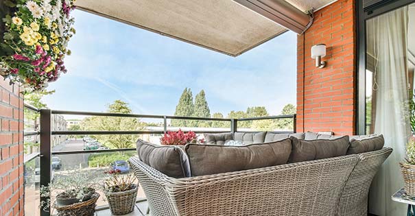 Exterior shades mounted on a patio for sun protection and comfort.