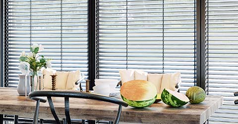 A view at Venetian blinds in apartment