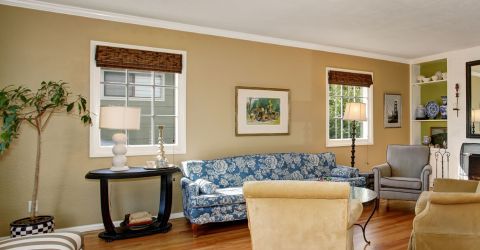 Vintage style living room with bamboo window shades