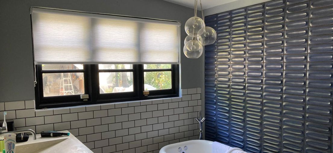 Bathroom Space with Elegant Roller Shades