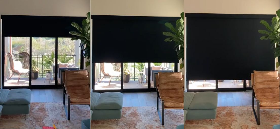 Sleek blackout fabric roller shade installed by Master Blinds