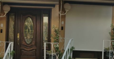 Exterior blackout Somfy shades installed at Marina Del Rey home entrance.