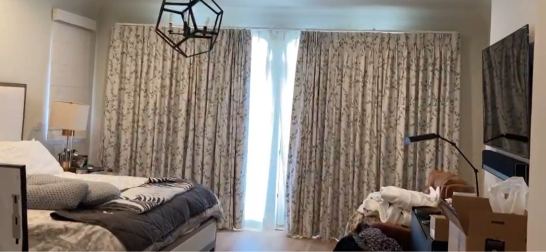 Custom blackout curtain system with elegant floral design in Culver City.