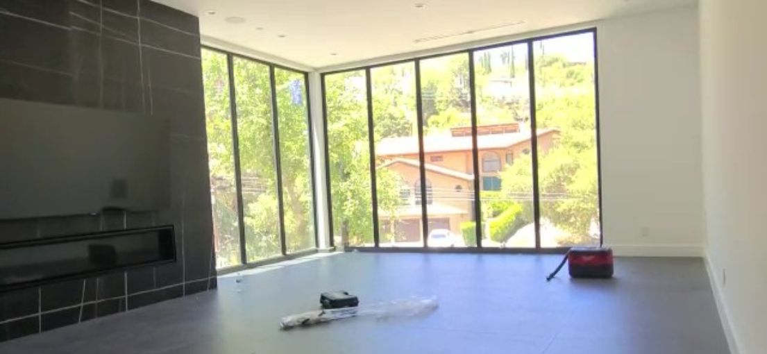 Electric roller shades in open position revealing panoramic view