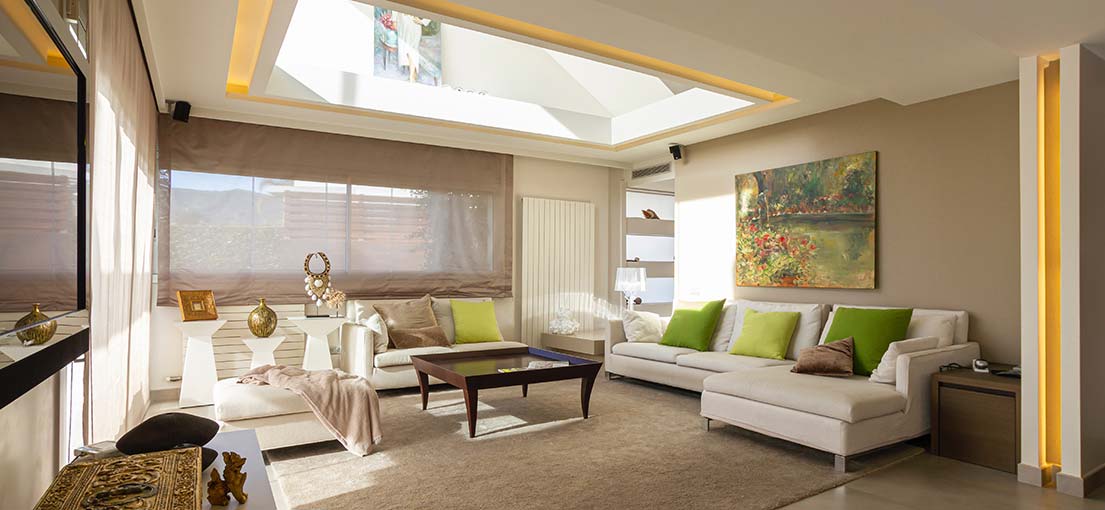 A look at modern living space with silk Roman shades window coverings