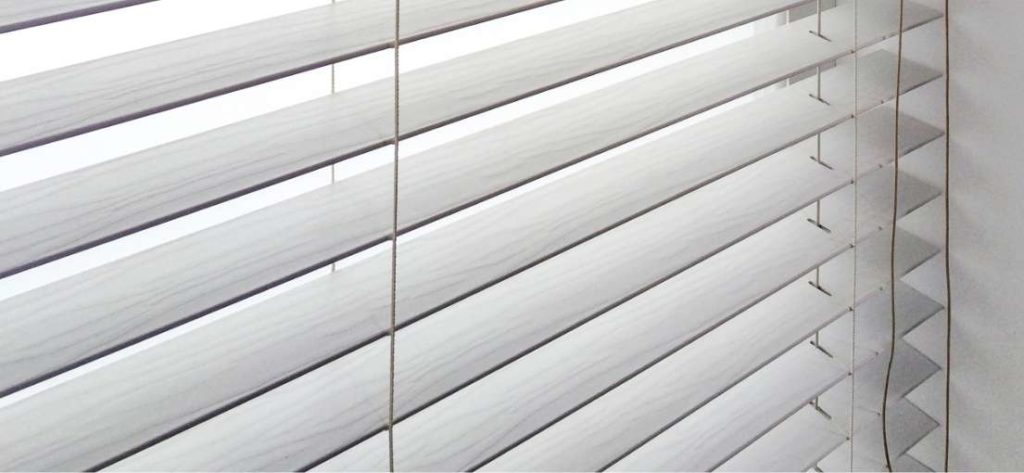 A view to a thick vinyl blind slats