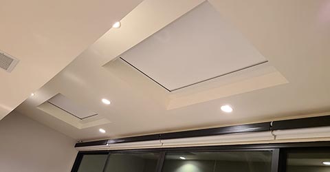 A view at a skylight window with wi-fi blinds