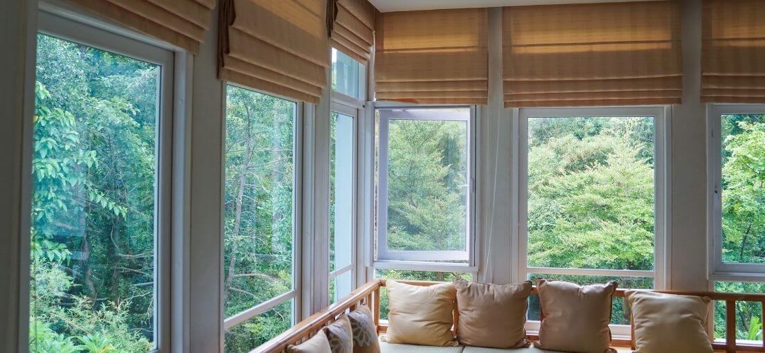 Roman brown shades in sitting room