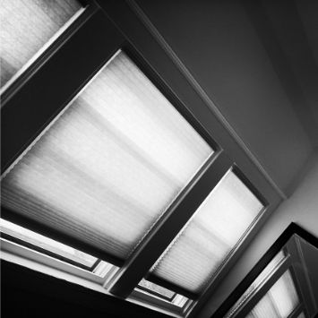 Skylight window with a cellular shade