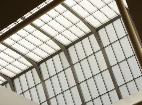 Hotel ceiling with skylight shading system
