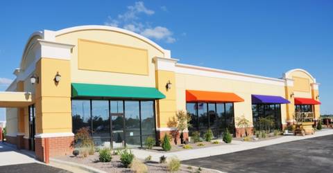 new commercial building with colorful awnings