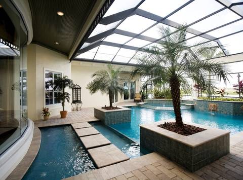 Luxury swimming pool with screen covered shade
