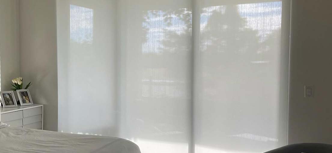 A view at master bedroom Lutron palladiom shades