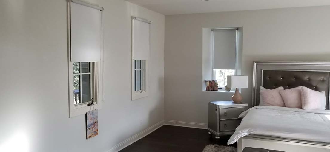 A view at Somfy motorized shades in bedrooms