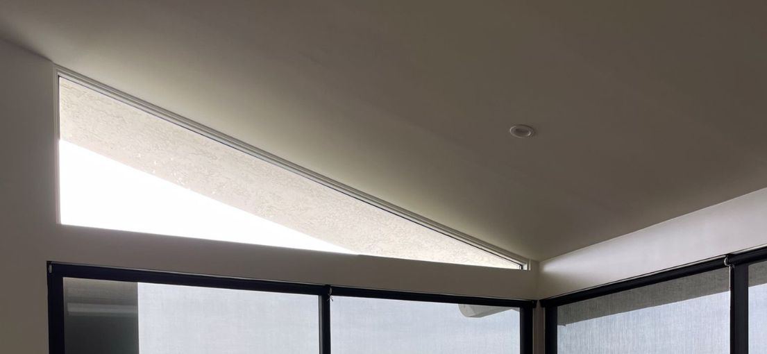 A view at Lutron motorized shades in apartment