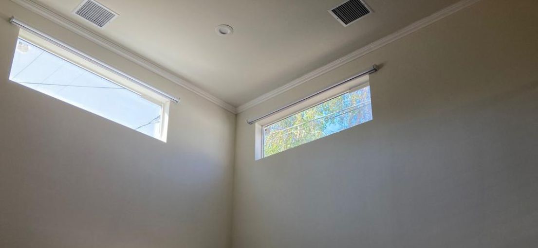 A view at blackout motorized window shades for high ceilings