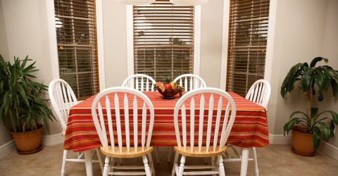 A view on a classic wooden blinds in a dining room