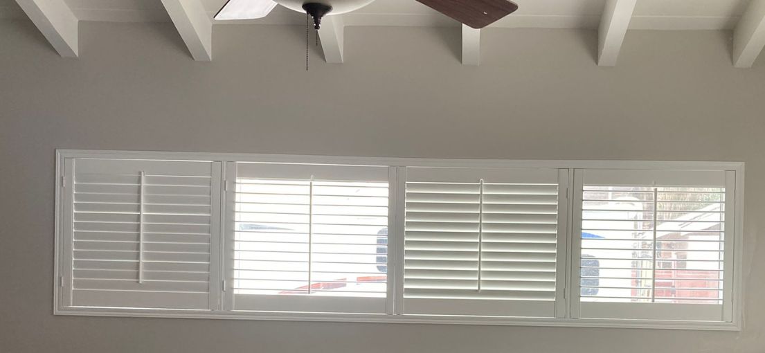 A view at window shutters in living room