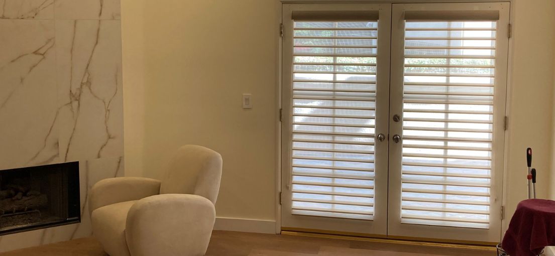 A view at woven blinds installation for patio doors