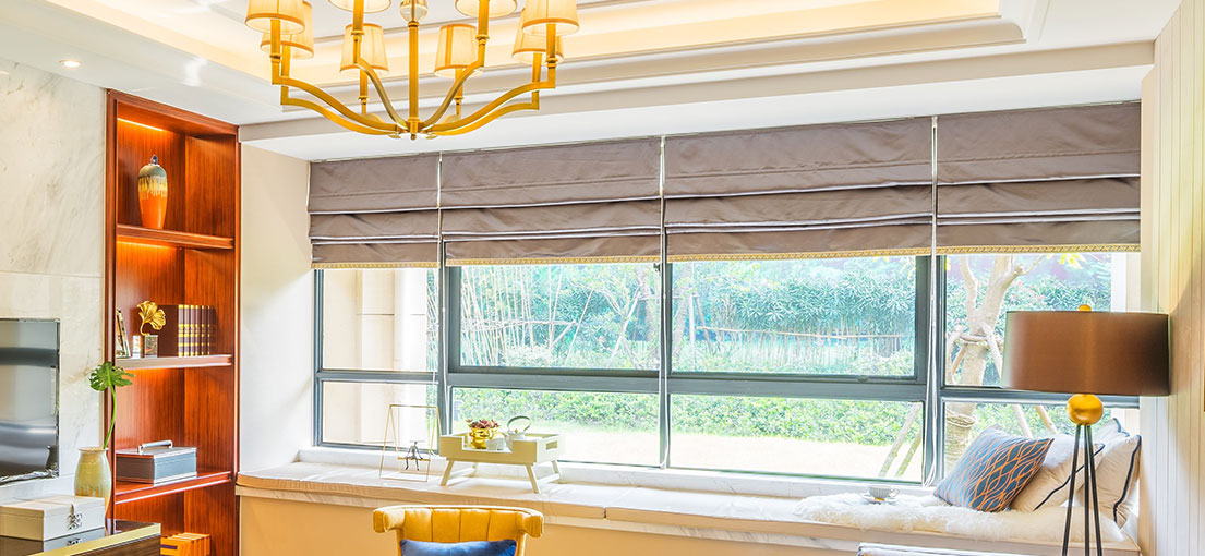 Heavy Roman window shades in a luxury living space
