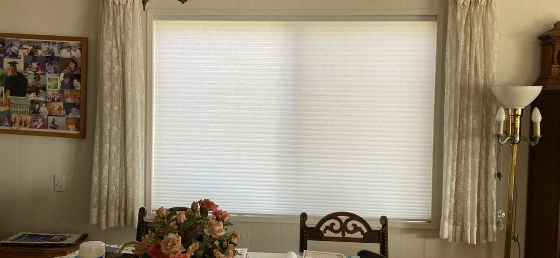 A view at cellular shades in dining room