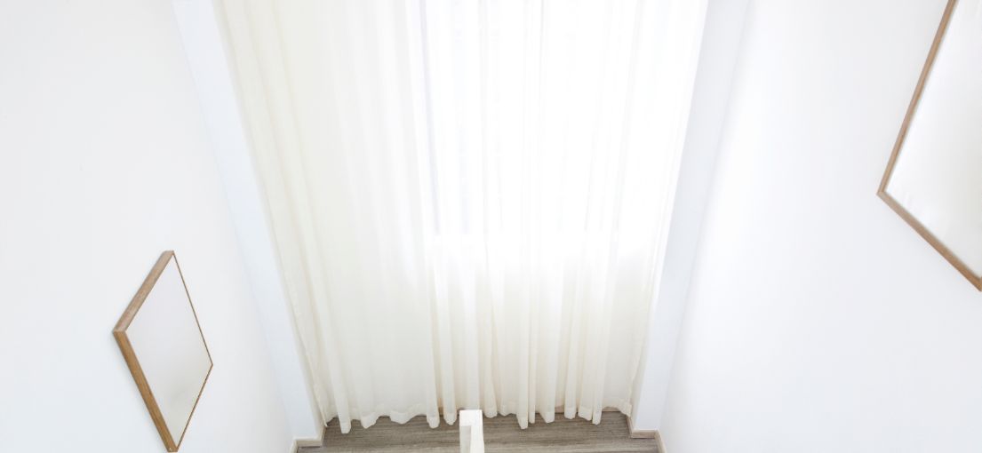 Curtains in a stairway hall
