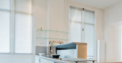 Sleek aluminum blinds in a contemporary kitchen