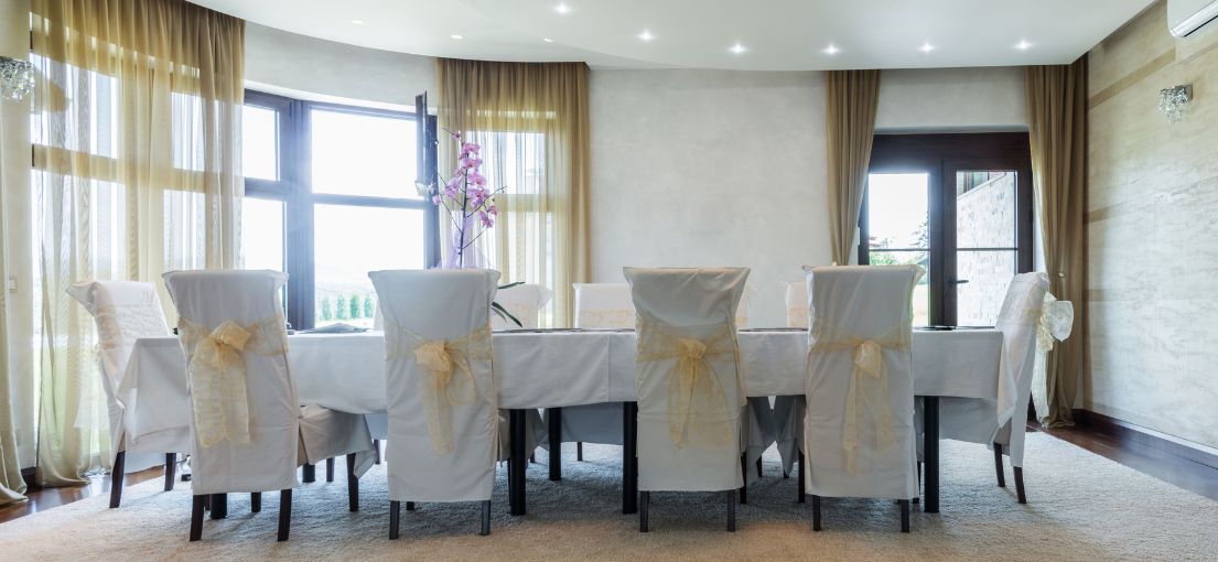 Luxury dining room with motorized custom curtains