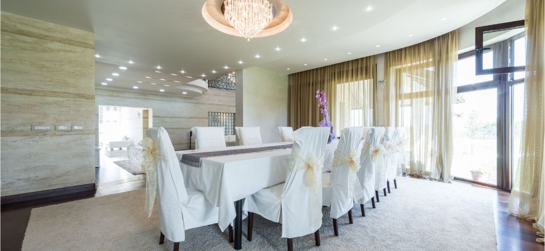 Luxury dining room with motorized custom curtains