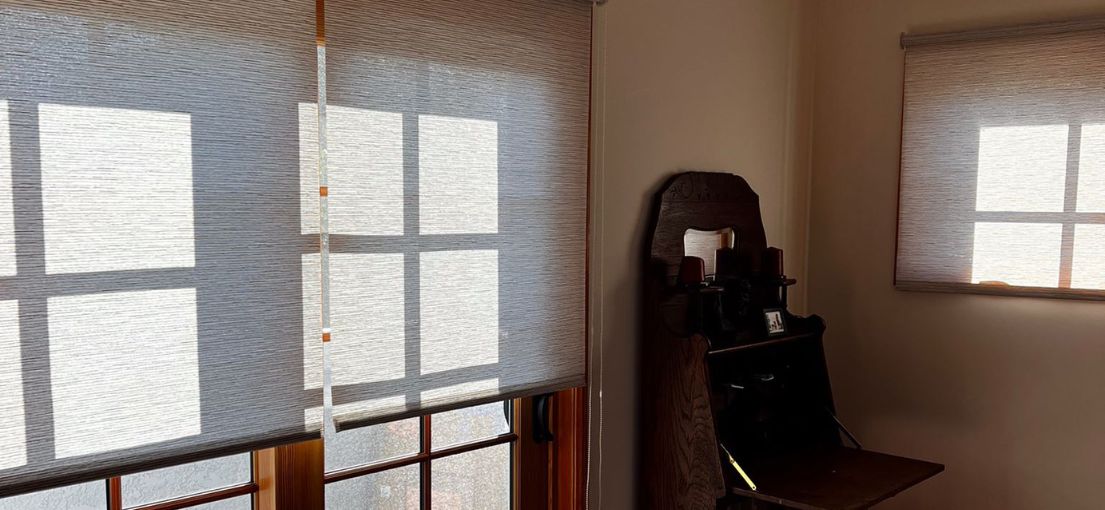 Cozy Bedroom Ambiance with Sheer Roller Shades in Burbank