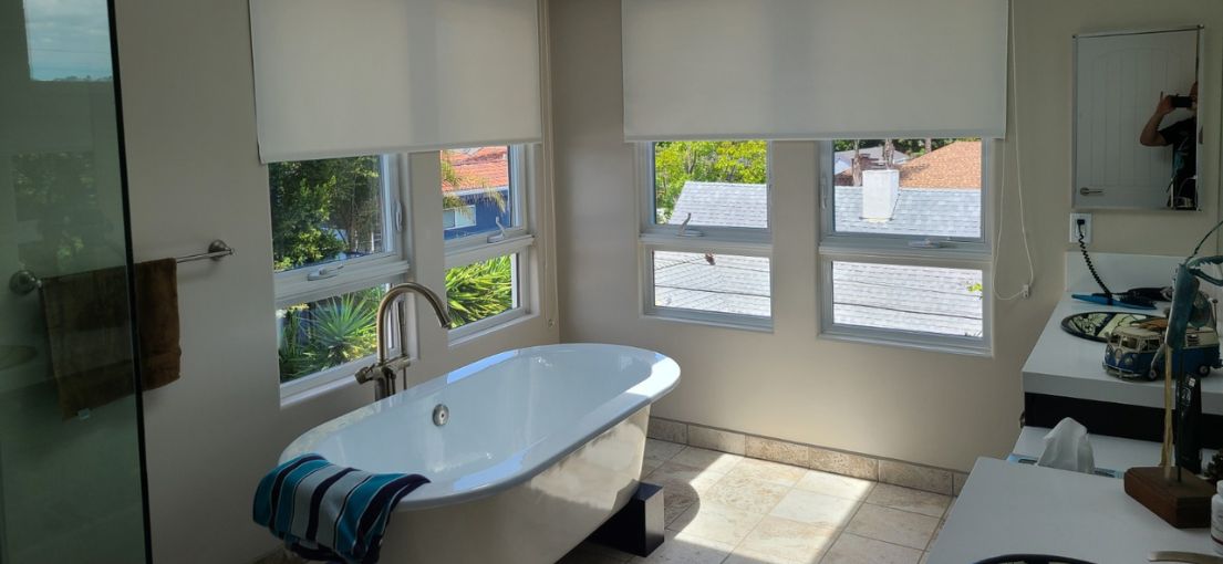 Sleek Window Coverings in Hollywood Hills House's Master Bathroom