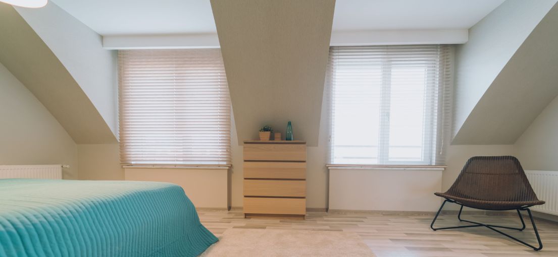 Master Blinds' craftsmanship shines in this Agoura Hills bedroom with aluminum window treatments.