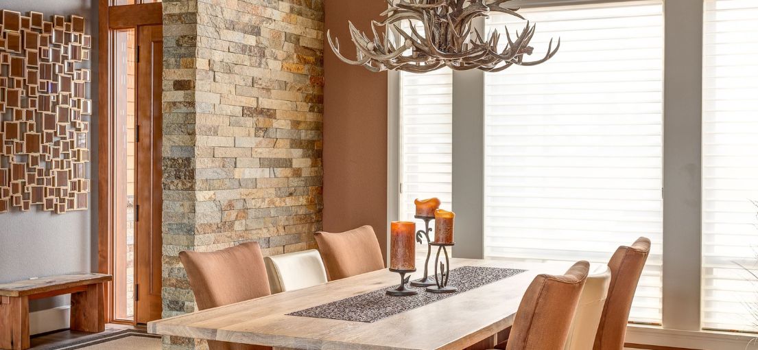Faux wood blinds adding sophistication to the dining area in West Hollywood residence