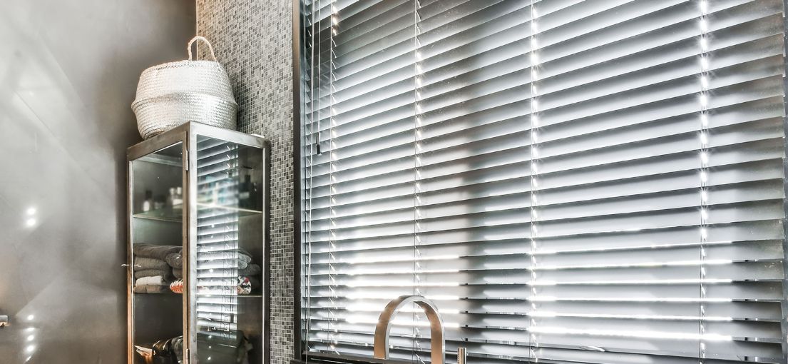 Elegant Window Treatment: Grey Venetian Blinds